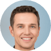 headshot of young smiling man